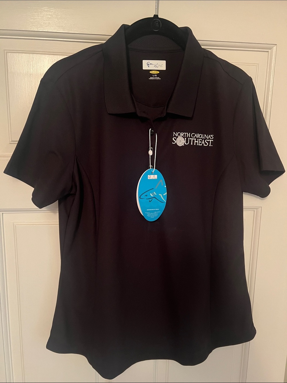 Greg Norman NWTs Black North Carolina's Southeast Logo Polo | Size Large